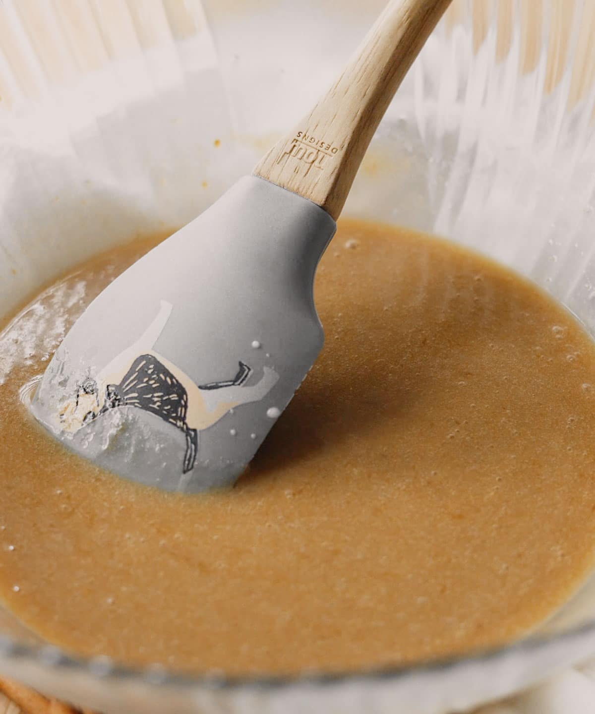 All wet ingredients mixed together in glass bowl.