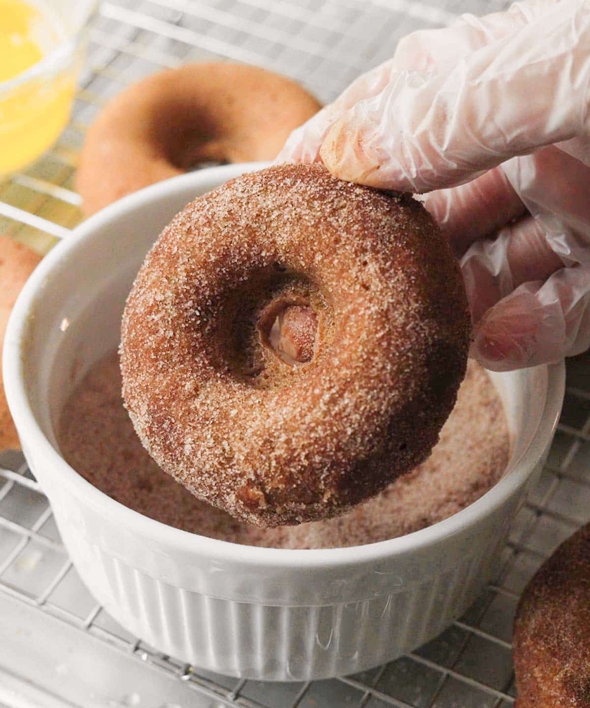 Mochi donut dipped in cinnamon sugar.