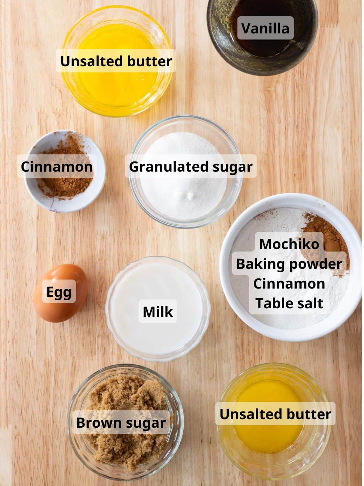 Labeled cinnamon mochi donut ingredients laid out on a table.