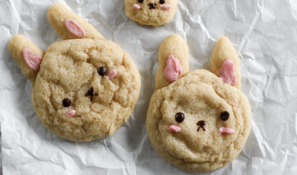 Multiple bunny sugar cookies laid out on a flat surface