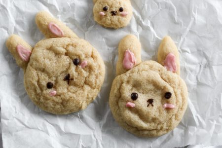 Multiple bunny sugar cookies laid out on a flat surface
