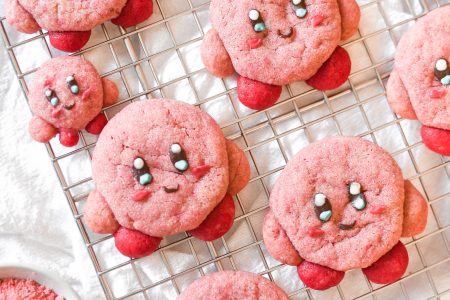 Kirby cookies on a wire rack
