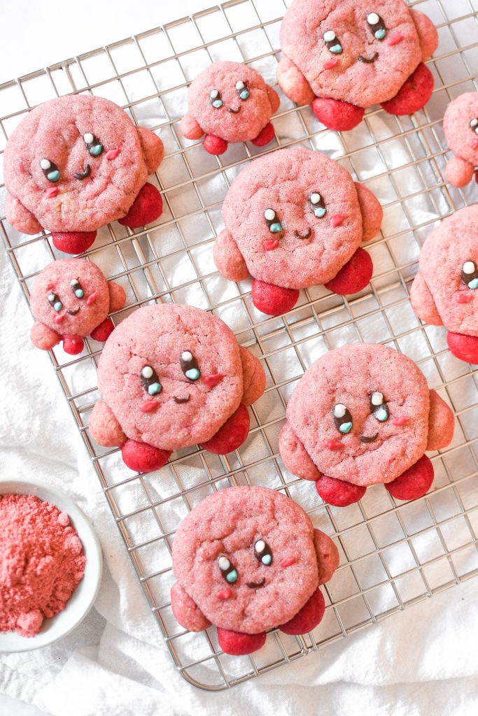 Kirby cookies on a wire rack