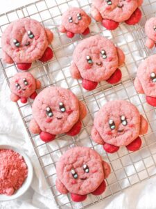 Kirby cookies on a wire rack