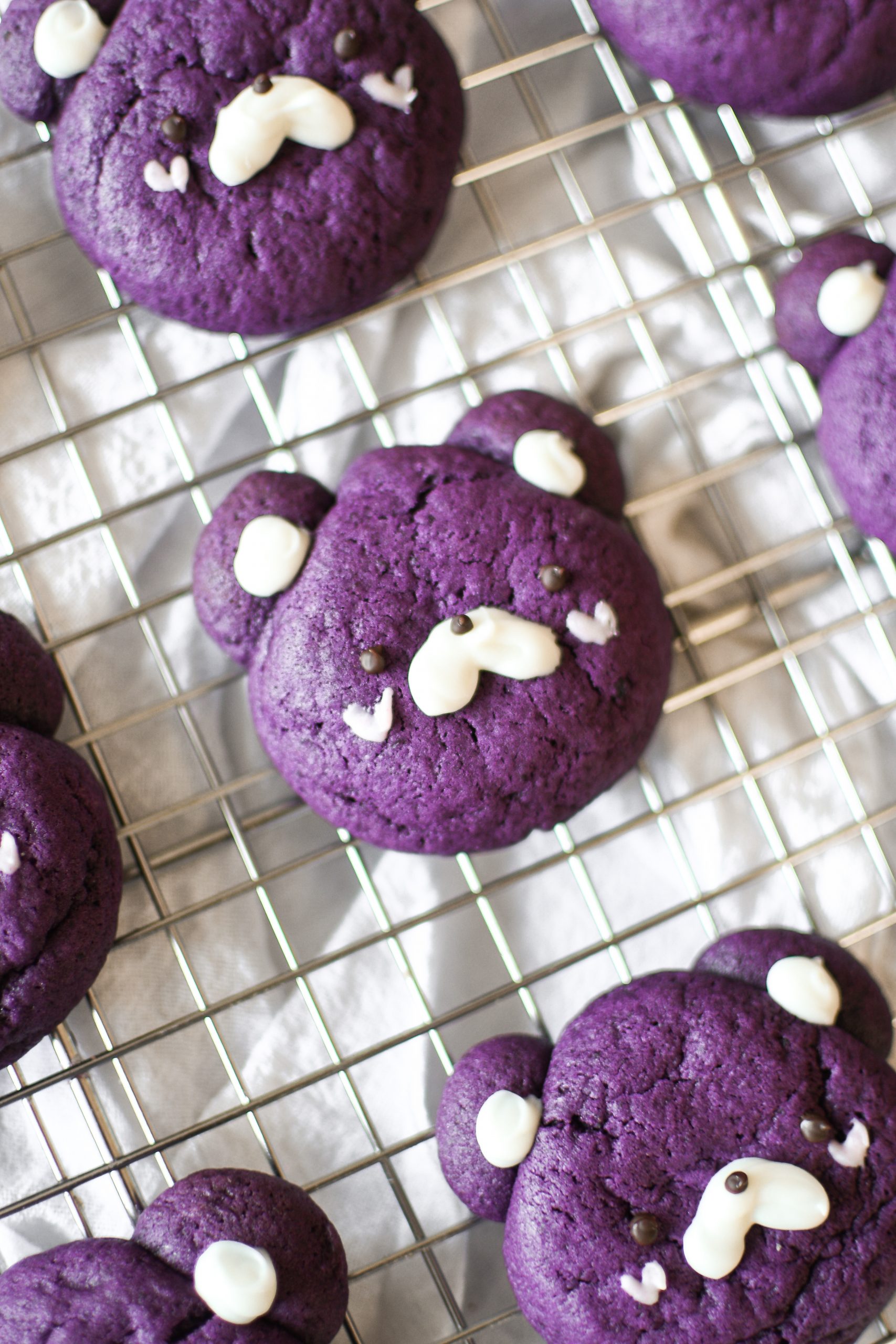 Close up of a coconut ube bear cookie