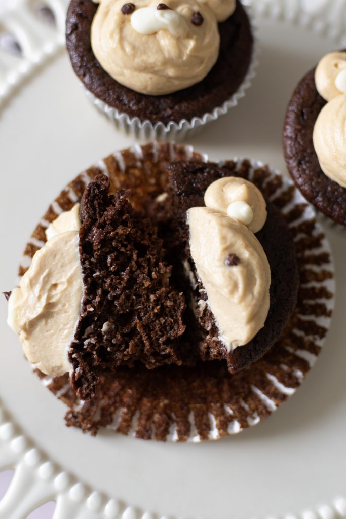 cross section of almond flour Chocolate bear cupcakes with peanut butter whipped cream frosting