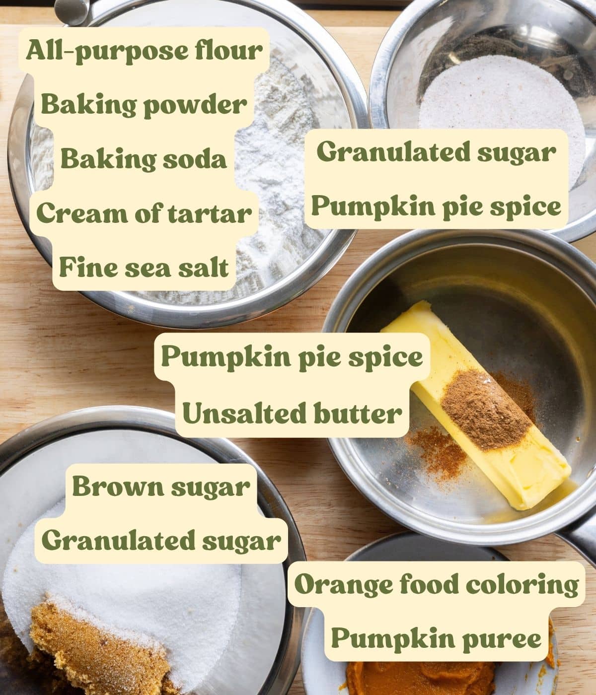 Labeled pumpkin snickerdoodle ingredients on a wooden table.
