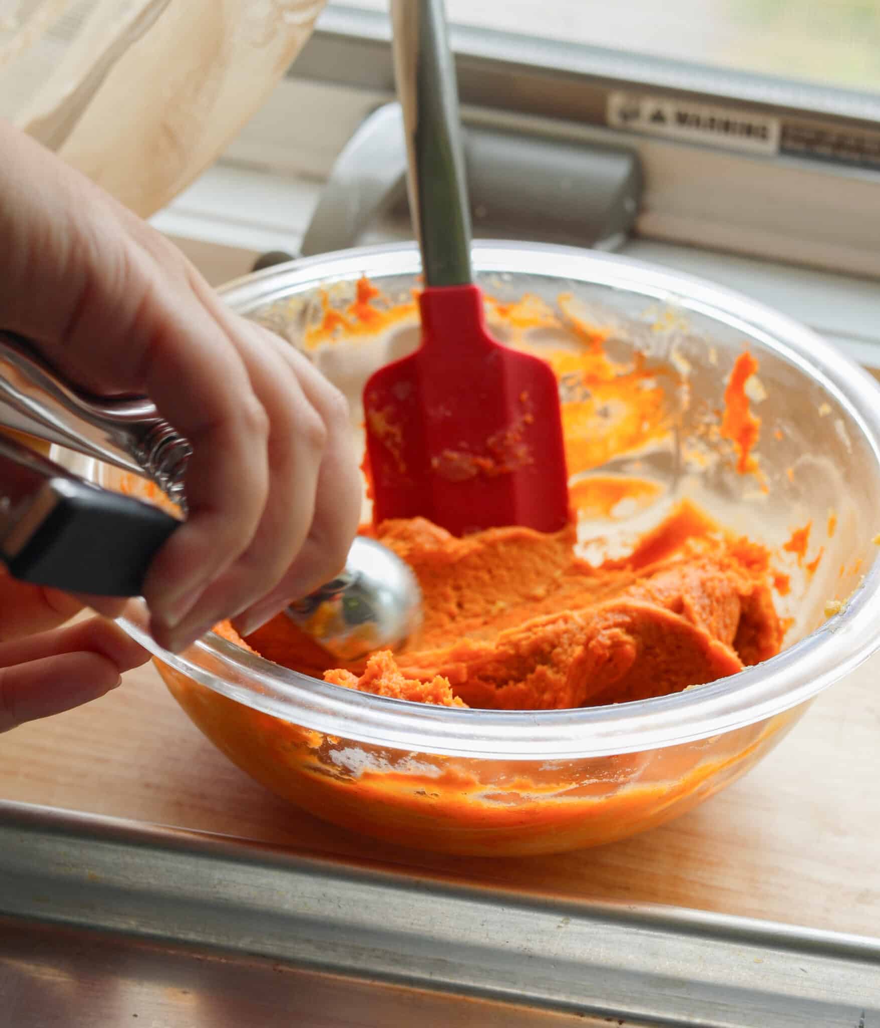 Egg-free pumpkin snickerdoodle dough in a glass bowl.