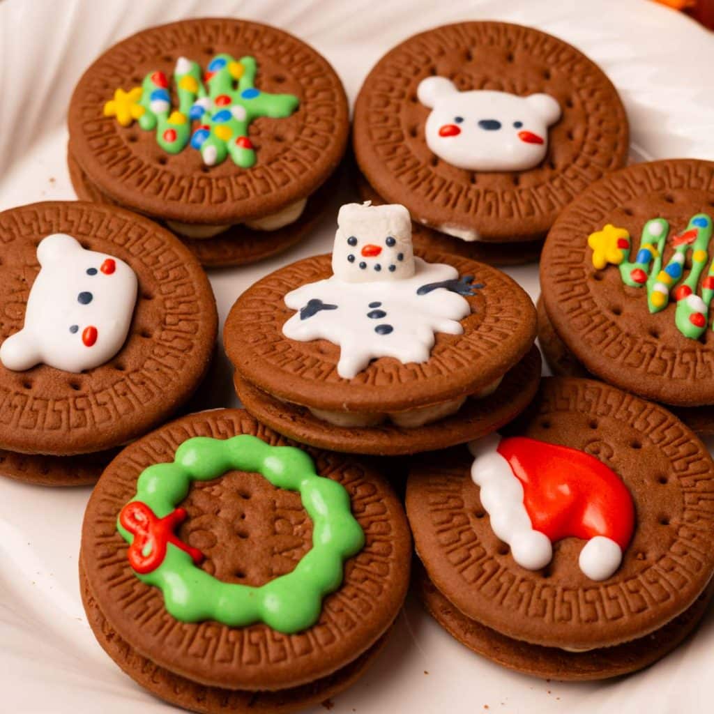 Chocolate Christmas cookie sandwiches filled with maple cream cheese frosting.