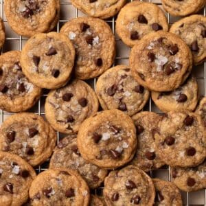 mini chocolate chip cookie bites layered on a wire rack