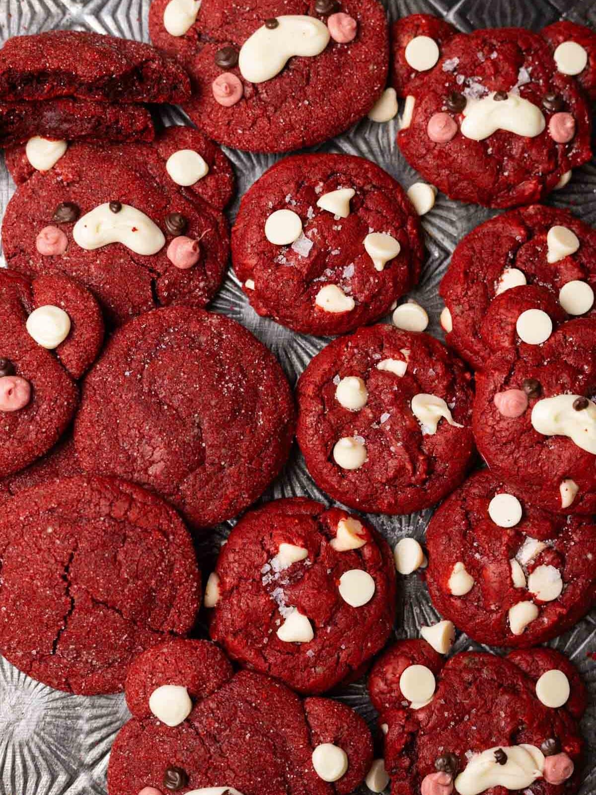 Red velvet cake mix cookies made two ways: red velvet sugar cookies and red velvet white chocolate cookies.