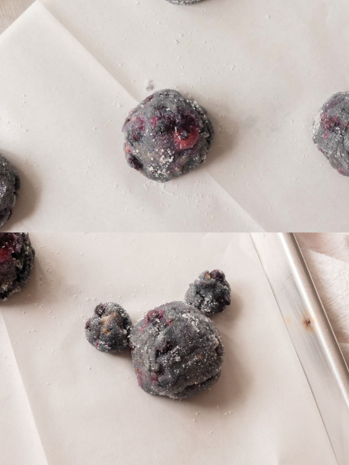 Blueberry sugar cookie dough shaped as a ball and another as a bear on lined cookie sheet.