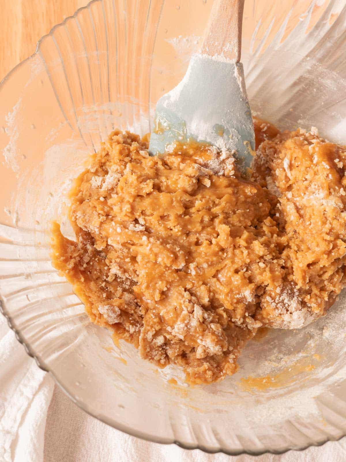 Cookie dough batter in mixing bowl.