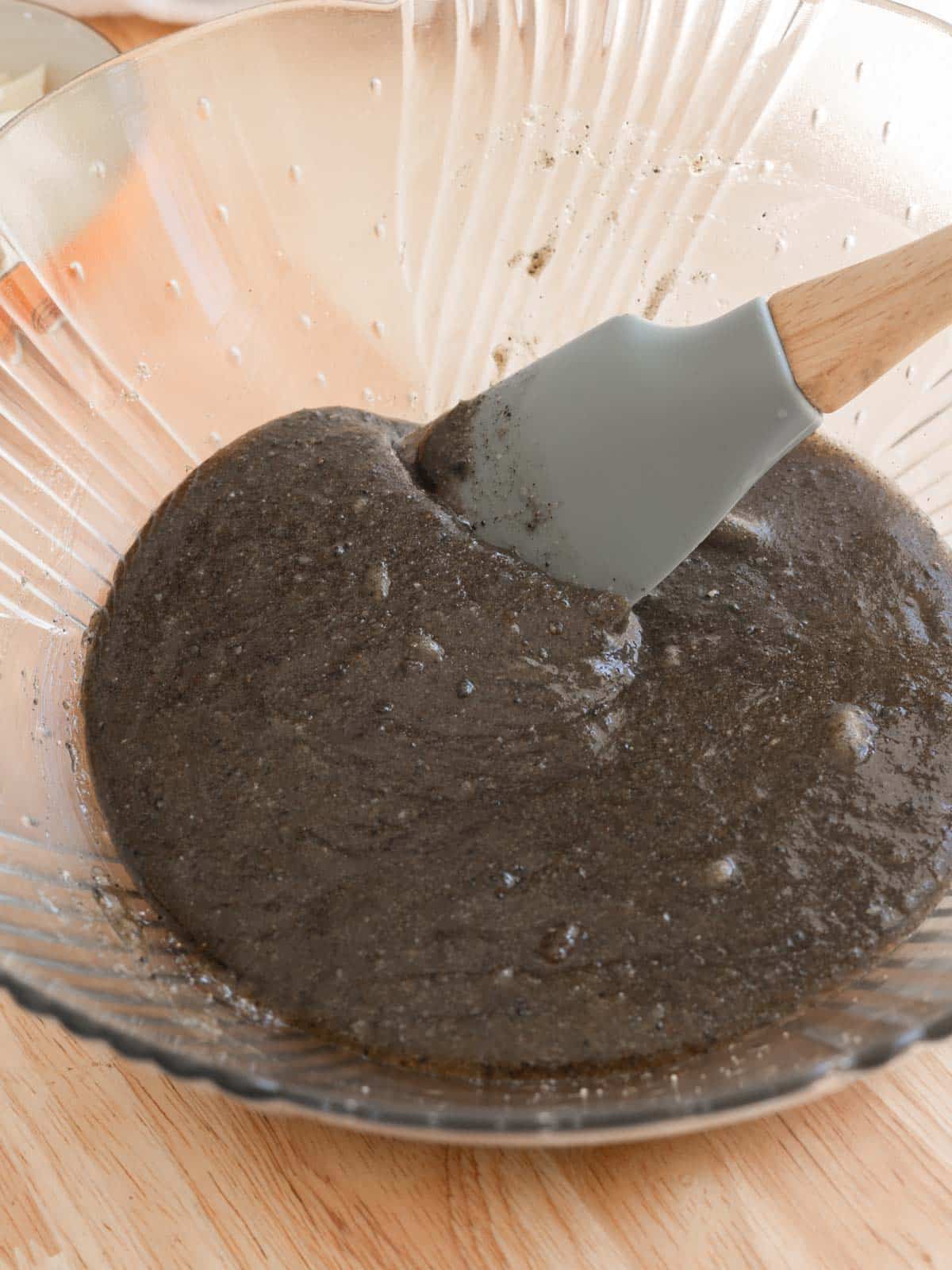 Thick batter of butter, sugars, egg, vanilla paste, and black sesame paste.