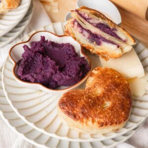 Ube hand pies stuffed with ube halaya and cheese.