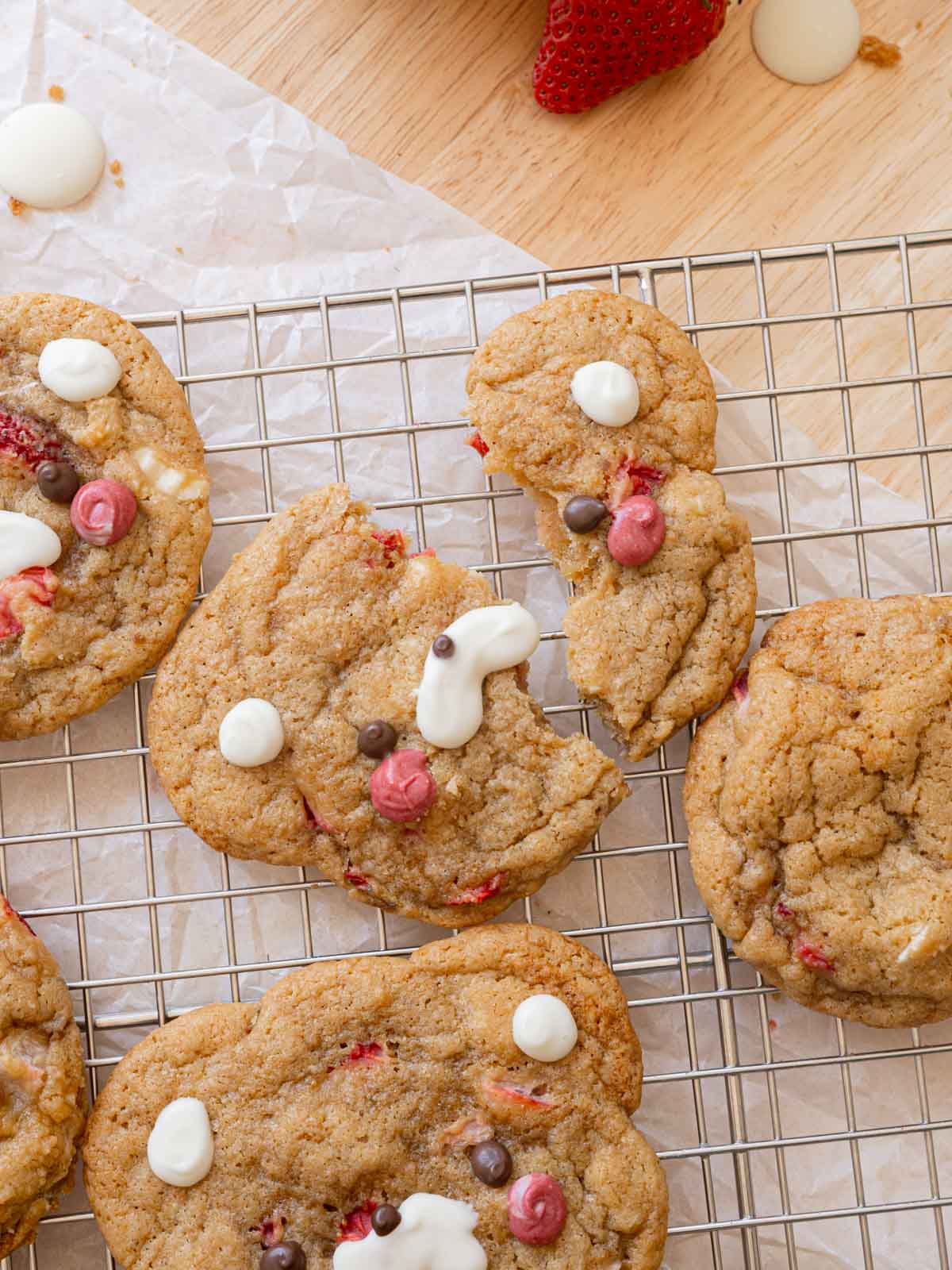 White chocolate strawberry cookies broken in half.