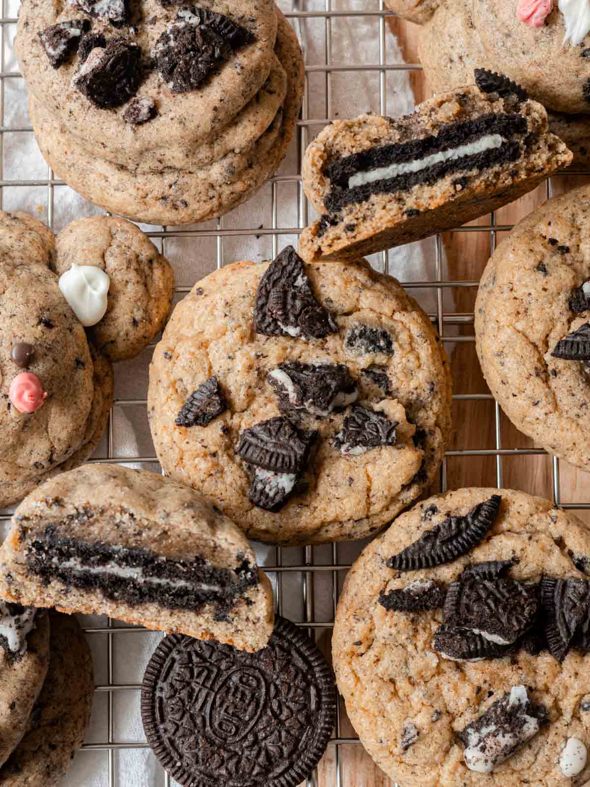 Oreo-stuffed cookies on a wire rack.