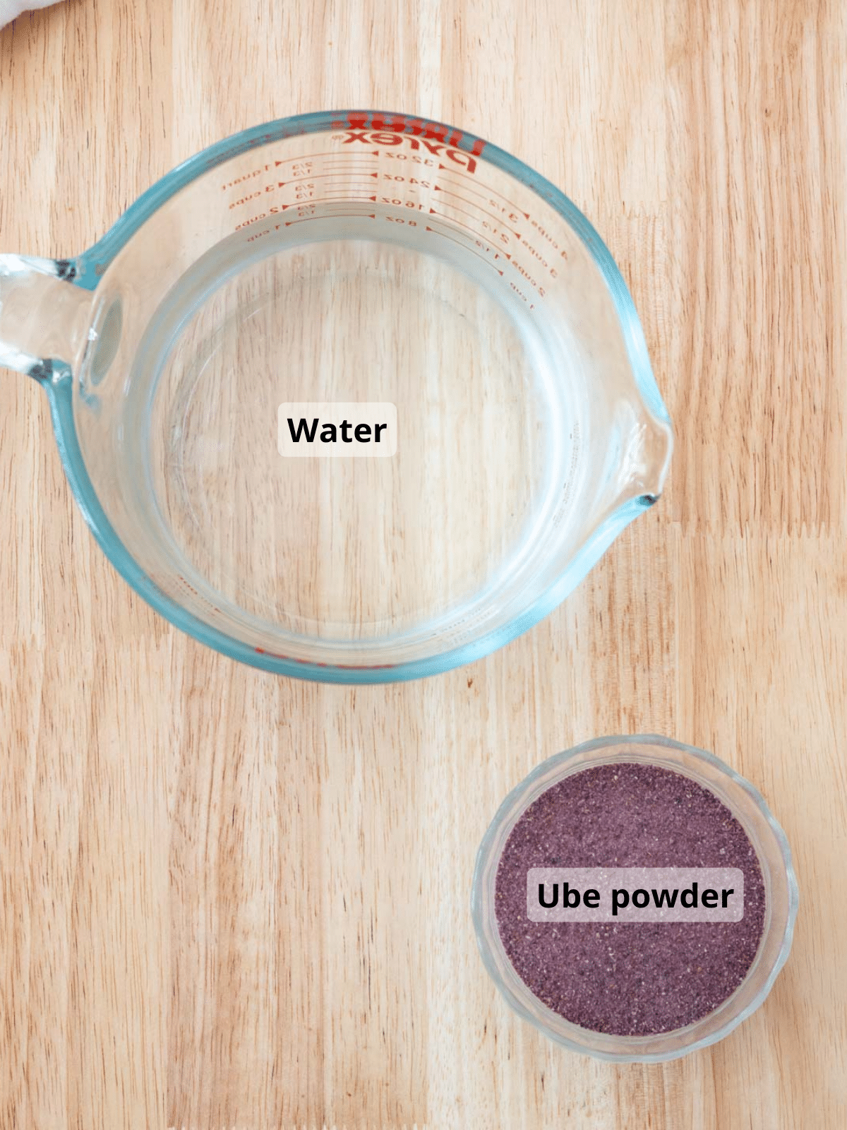 Rehydrated ube powder ingredients on a wooden kitchen island.