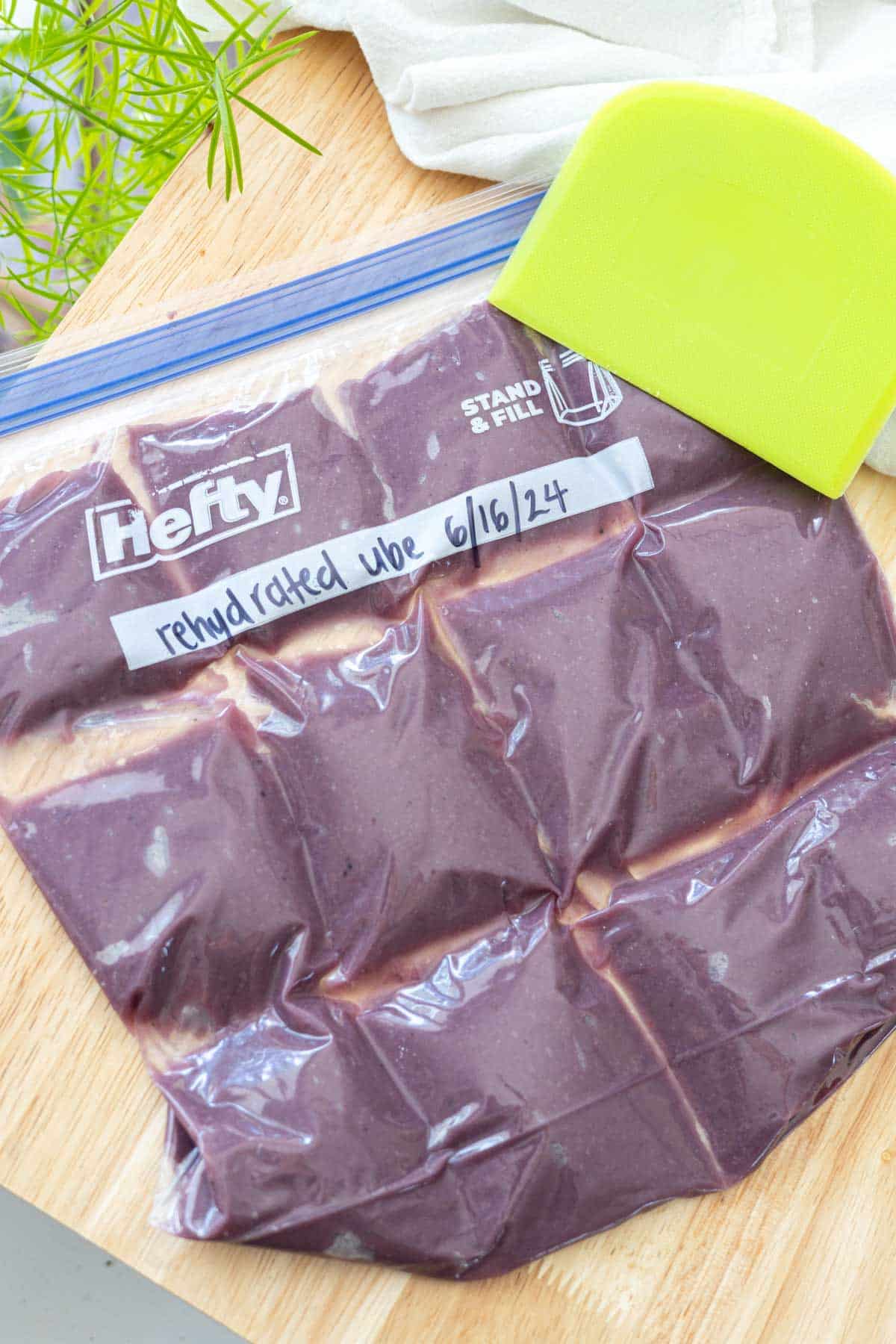 Rehydrated ube powder portioned out in a large freezer-safe Hefty bag. 