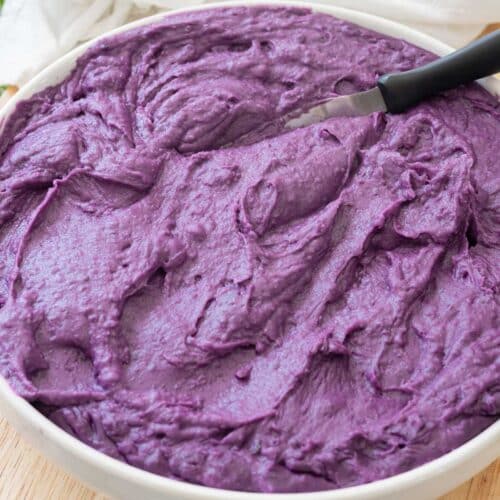 Creamy ube halaya in a large white bowl.