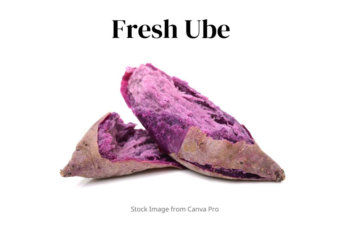 Stock image of freshly cooked purple ube broken in half.