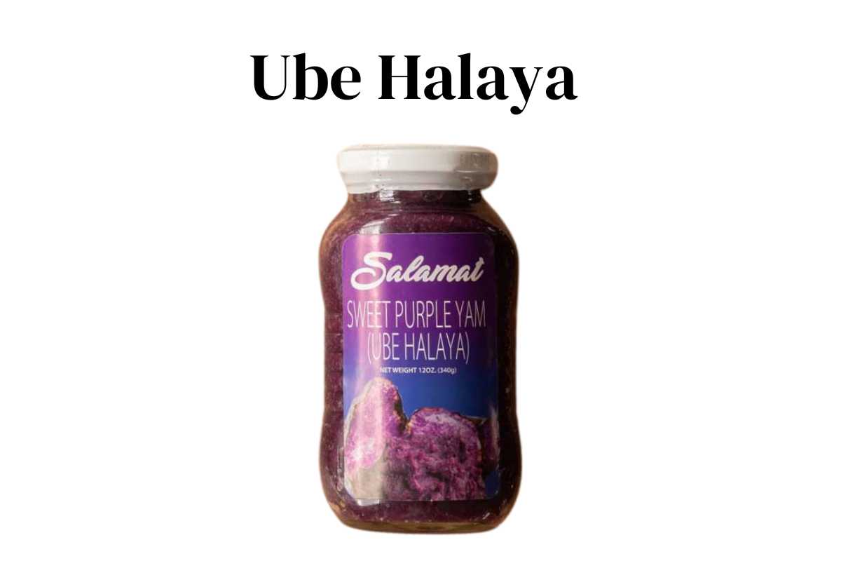 Ube halaya in a glass jar with a white background.