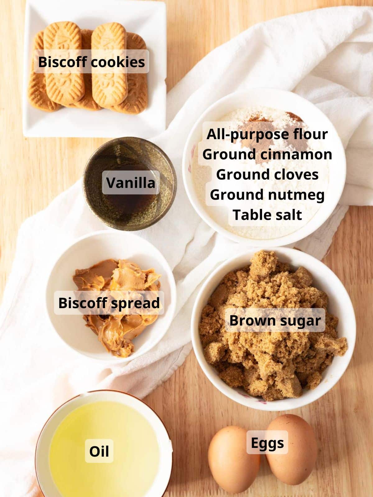 Labeled biscoff blondie ingredients laid out on a table.