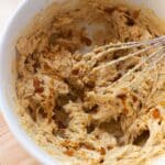 Homemade brown sugar maple butter in a white mixing bowl.