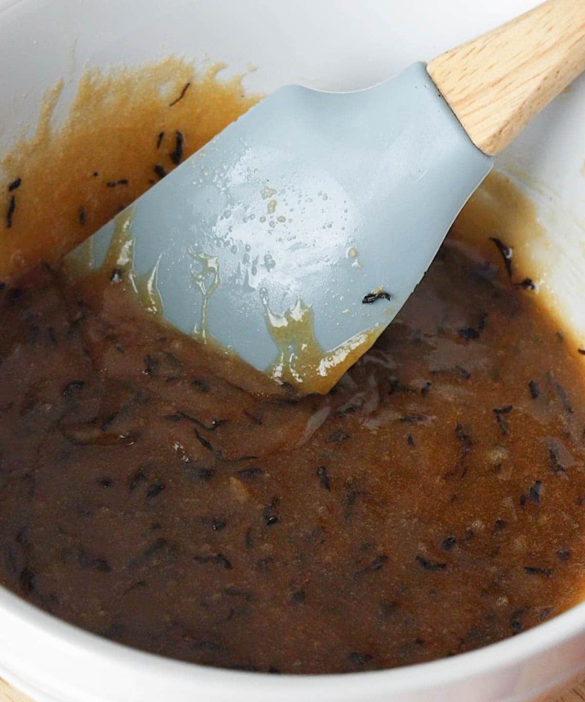 Wet ingredients mixed into a bowl.