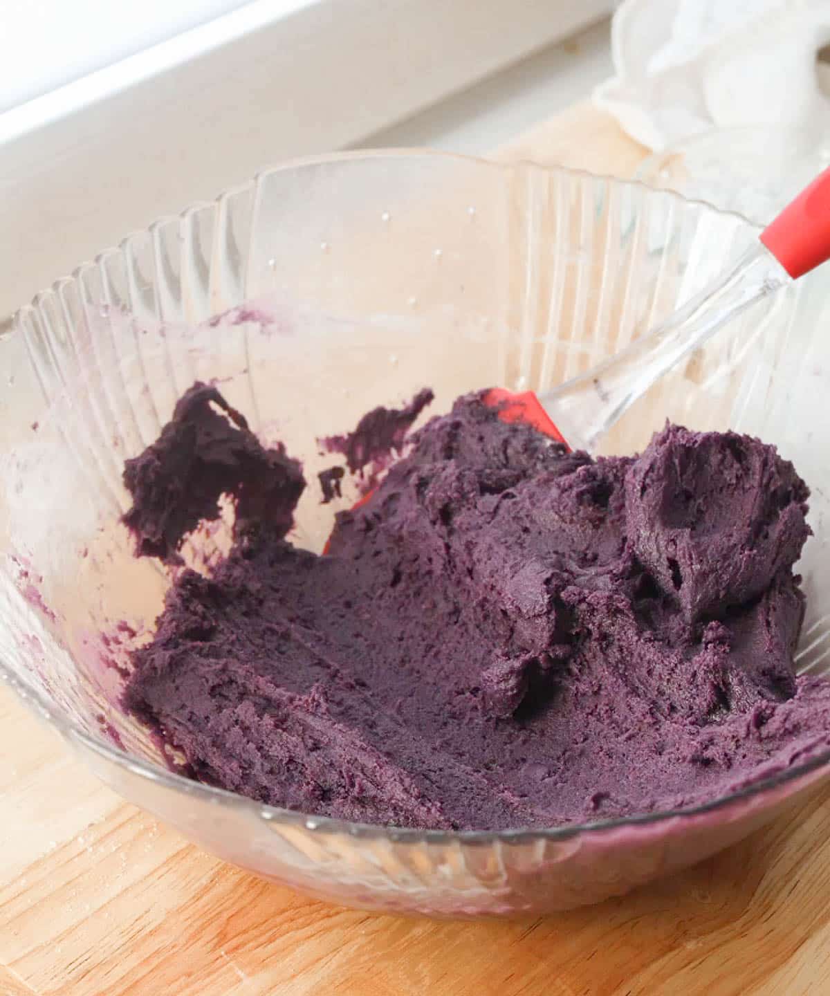 Ube crinkle cookie dough ready to be scooped.