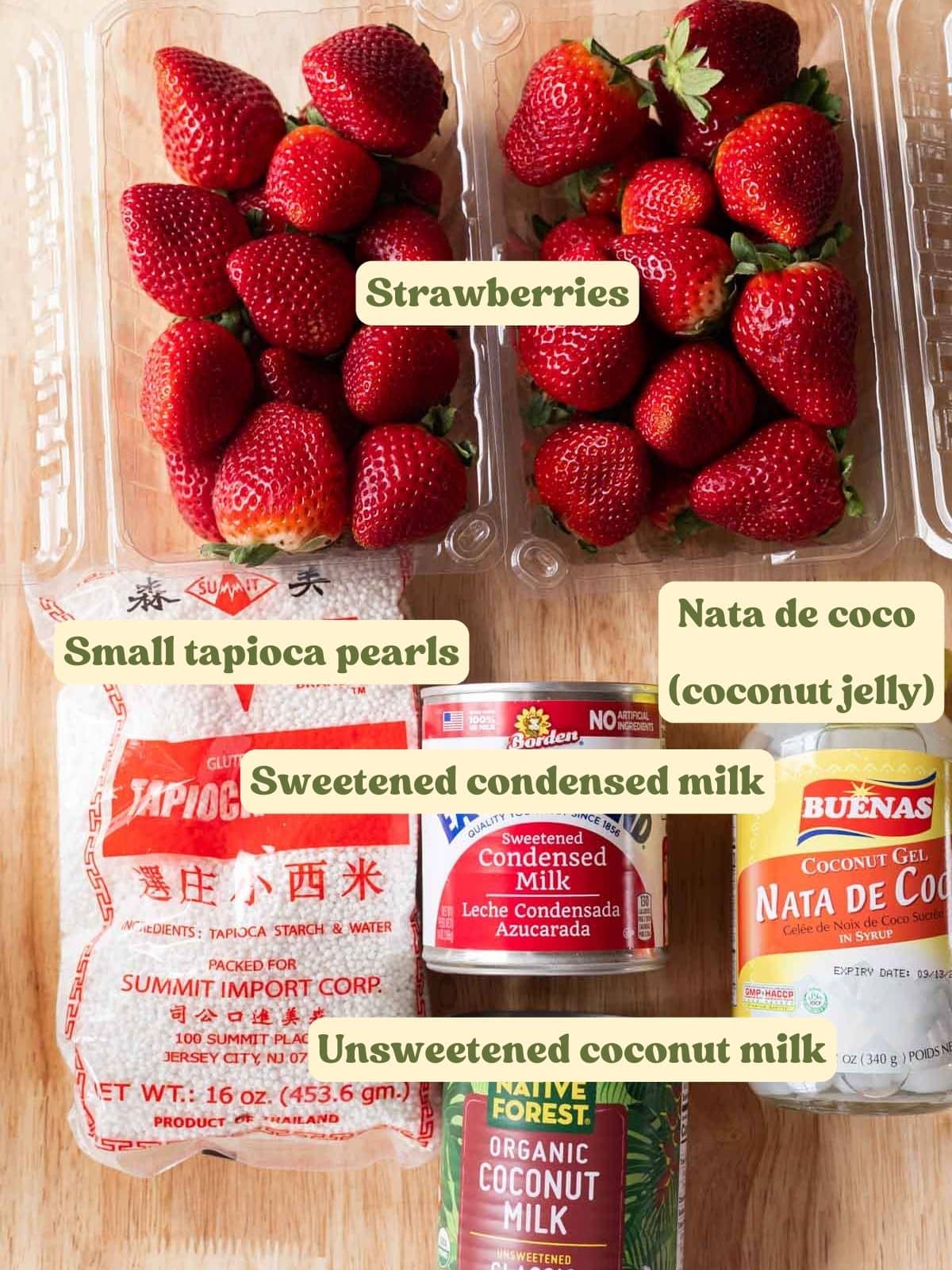 Strawberry sago labeled ingredients on a wooden table.