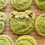 Frog matcha sugar cookies on a wire rack.