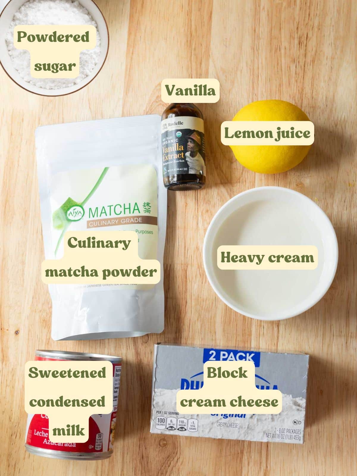 No bake matcha cheesecake filling labeled ingredients on a wooden table.