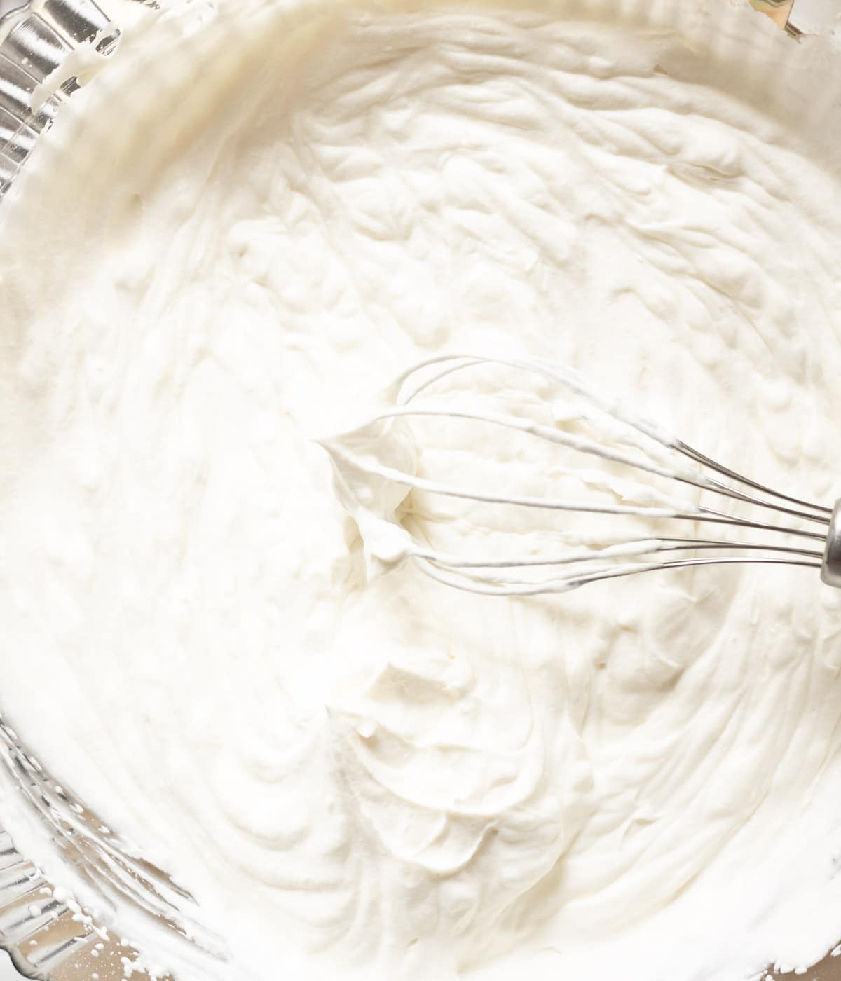 Fluffy whipped cream frosting ready to be used.