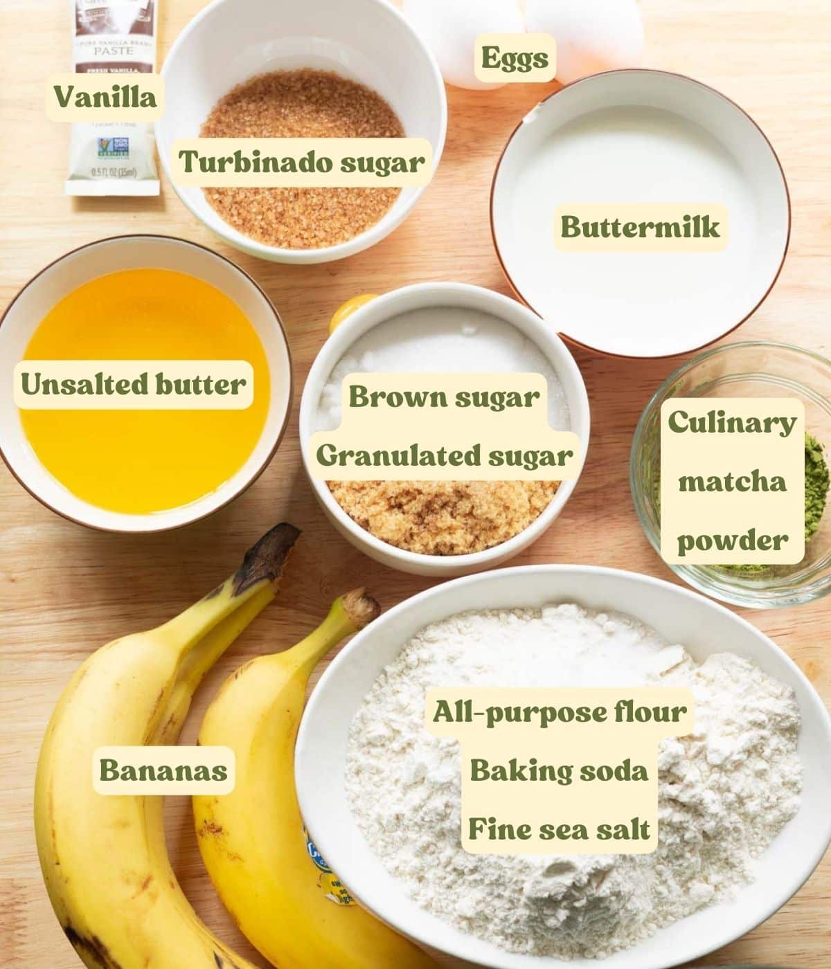Macha banana bread ingredients on a wooden table.