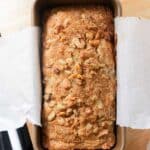 Walnut banana bread in loaf pan.