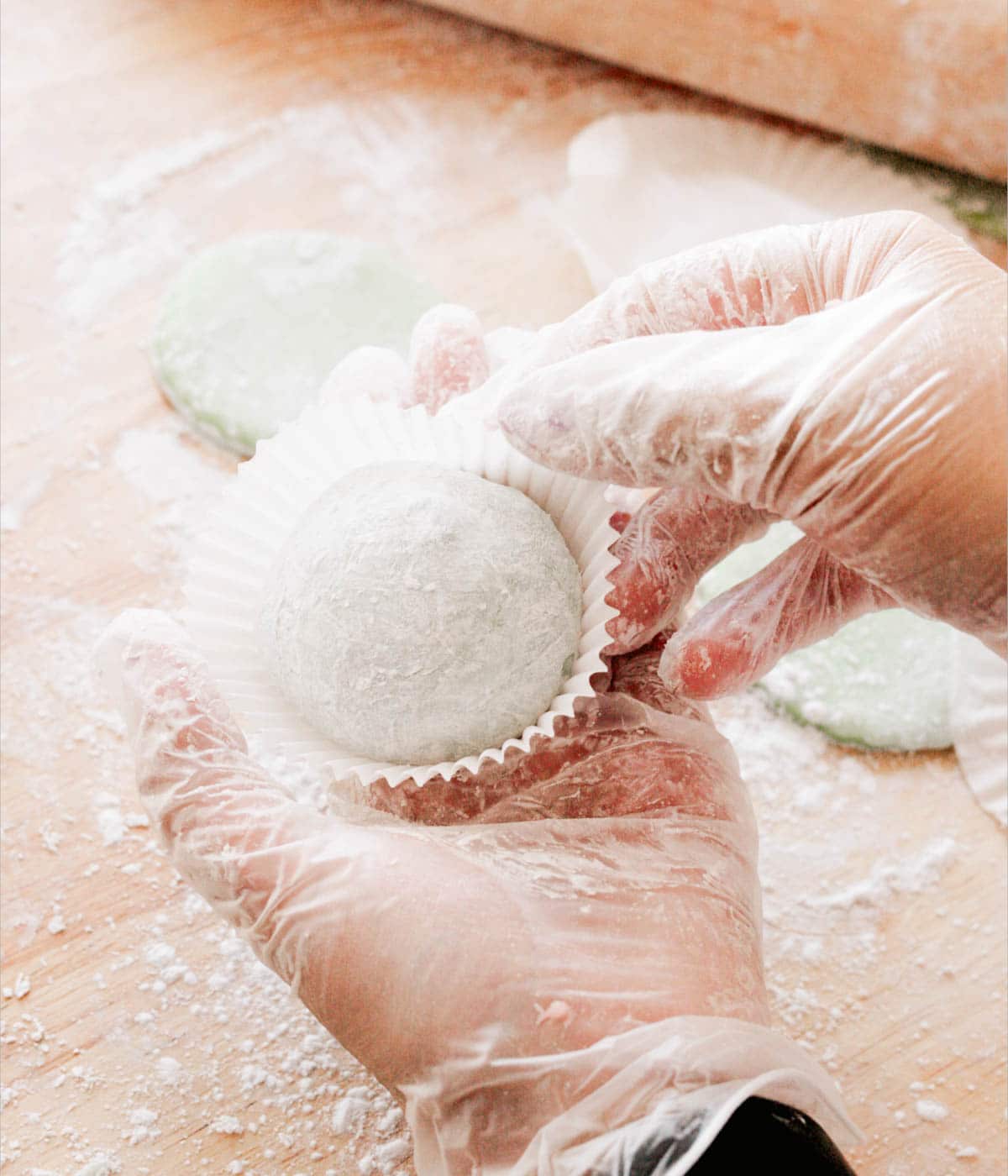 Mint mochi ice cream in cupcake liner.