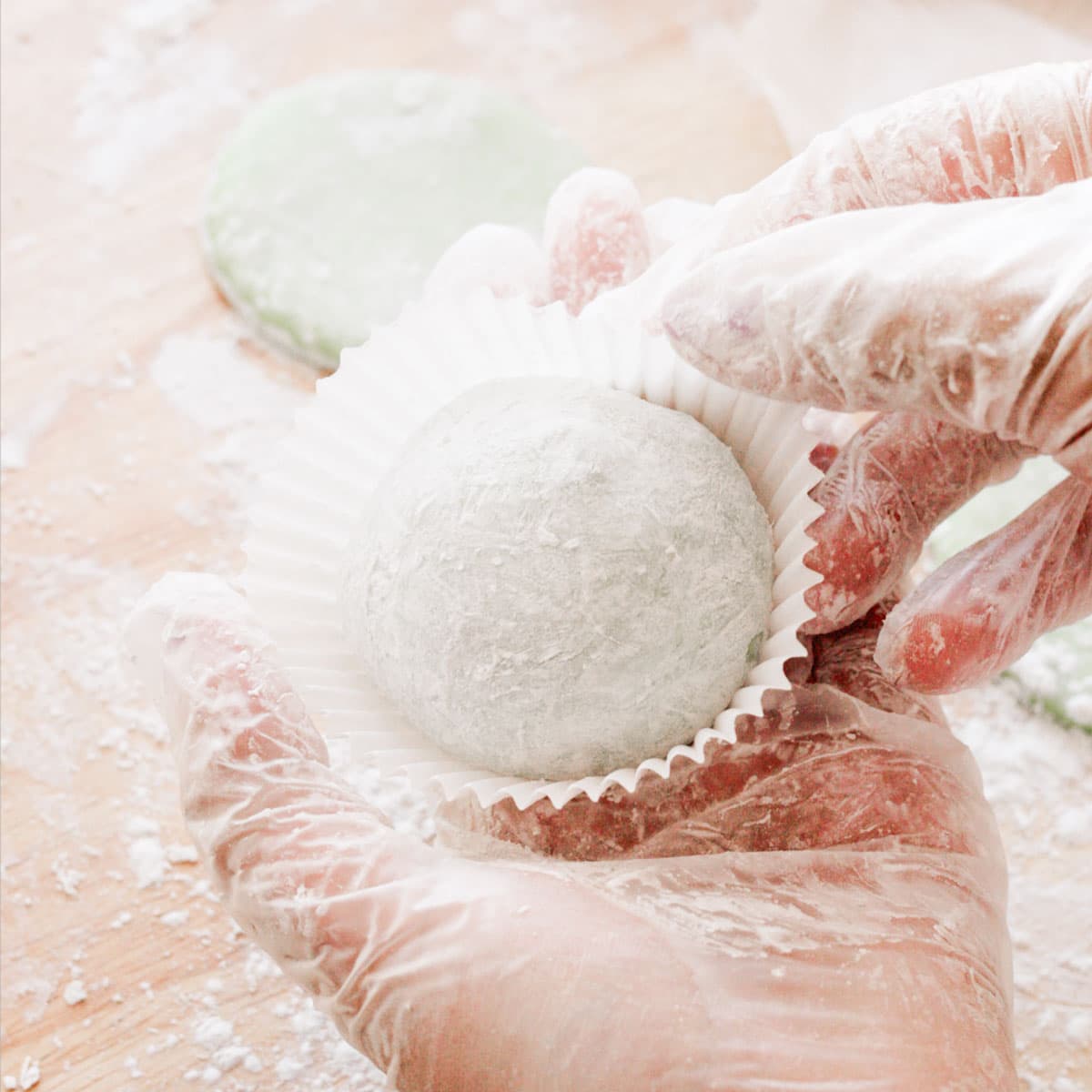 Mint mochi ice cream in cupcake liner.