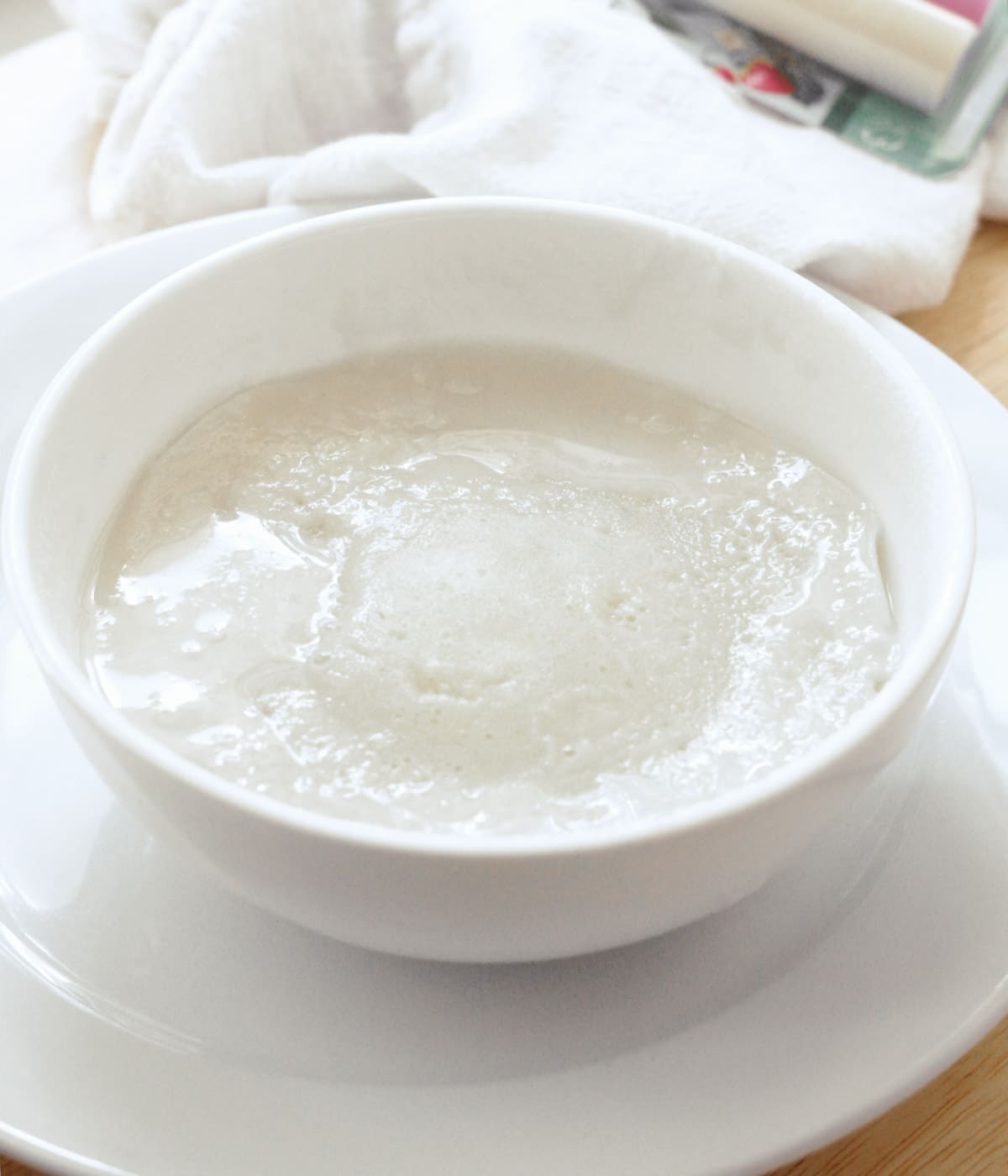 Mochi dough in bowl, ready to be kneaded.