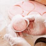 Strawberry mochi ice cream in cupcake liner.