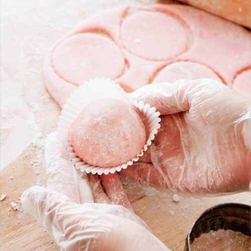 Strawberry mochi ice cream in cupcake liner.