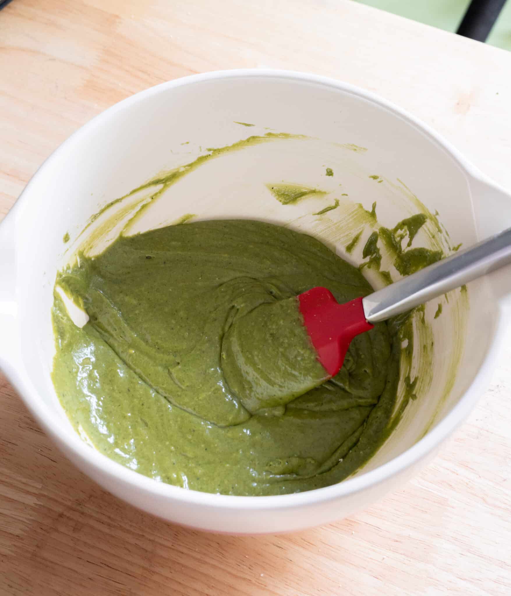 Matcha brownie wet ingredients mixed together.