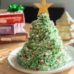 Christmas tree cake decorated with sprinkles.