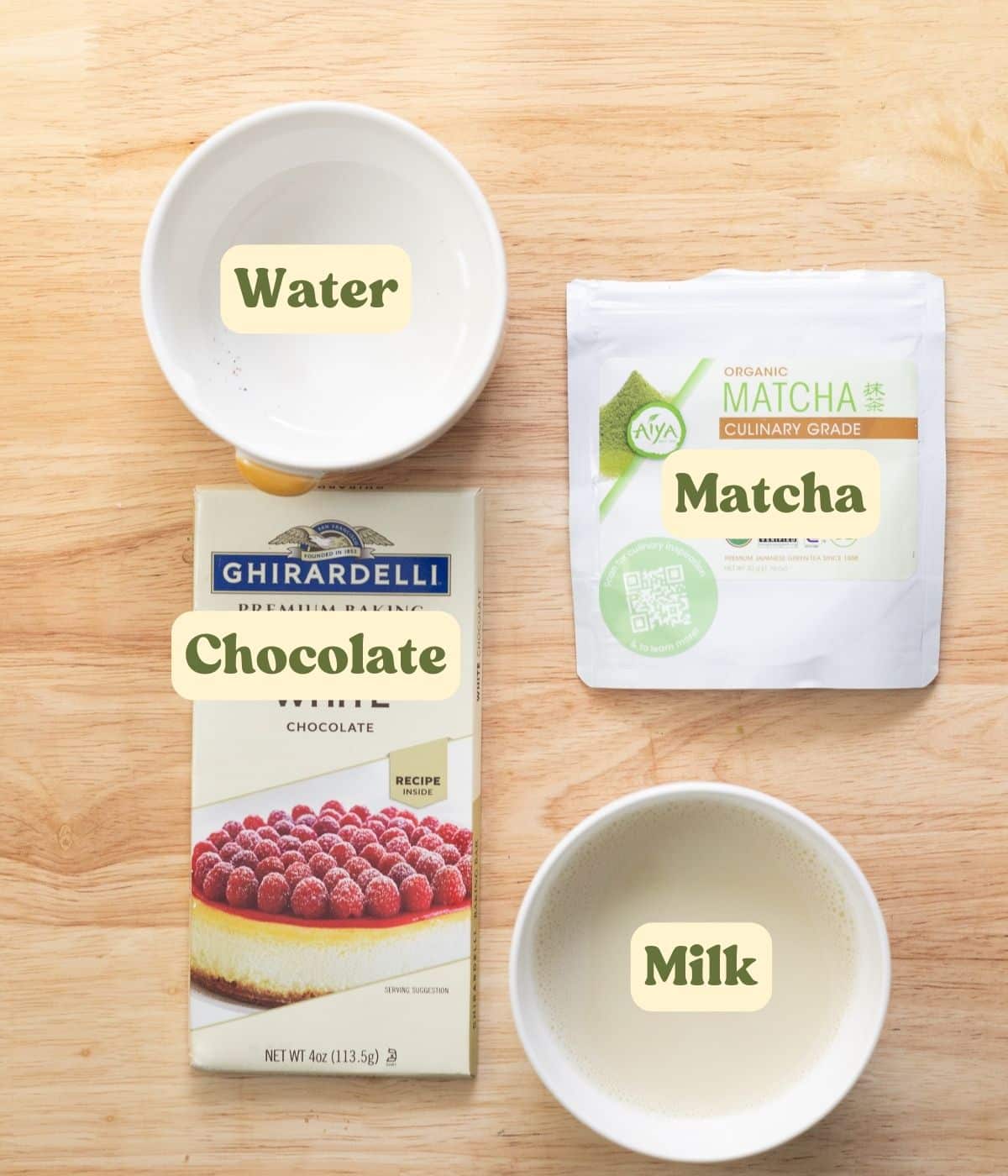 Matcha hot chocolate labeled ingredients on a wooden table.