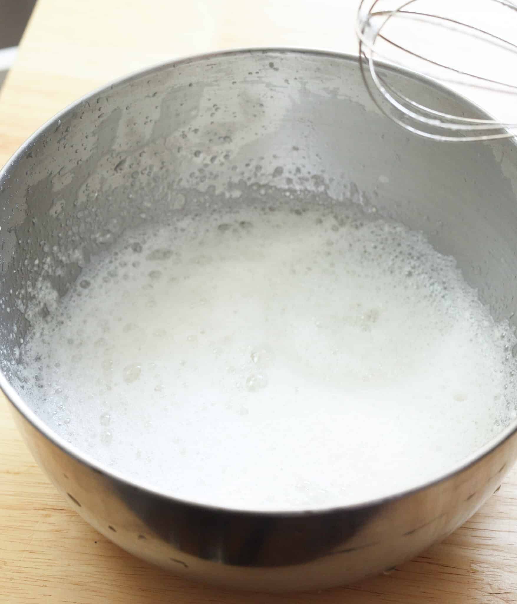 Frothy mixture of meringue powder and water.