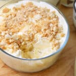 Homemade banana pudding made in a glass container.