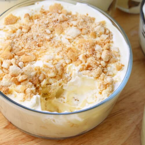 Homemade banana pudding made in a glass container.