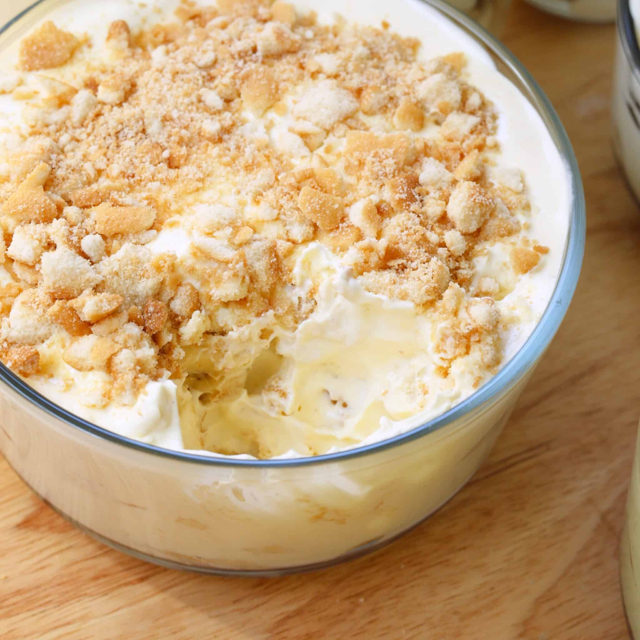Homemade banana pudding in a glass container.