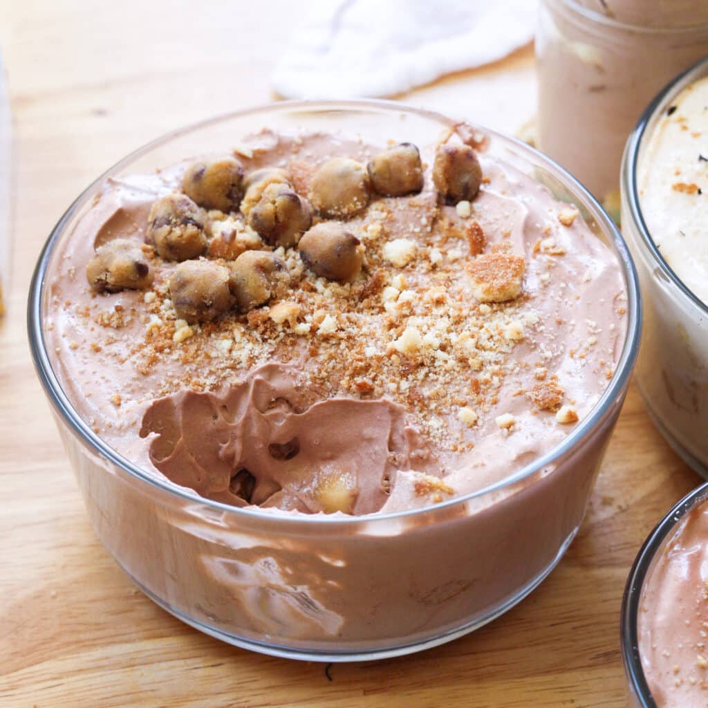 Chocolate banana pudding with a bite taken out of it.