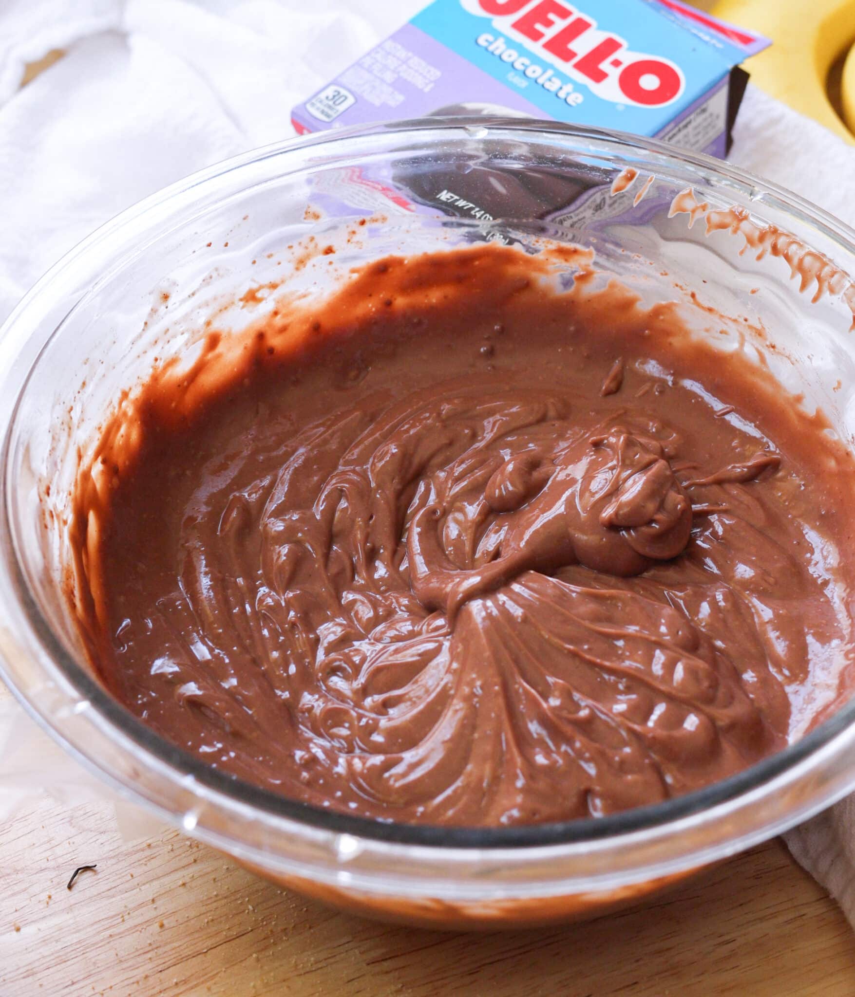 Mixed instant chocolate pudding in a glass bowl.